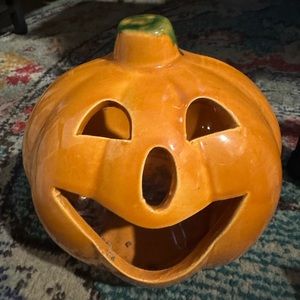 Glass pumpkin candle holder